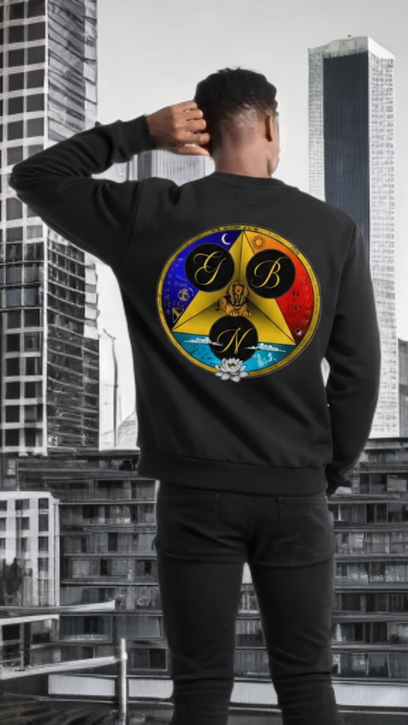 Person wearing a black sweatshirt with a colorful logo in an urban setting