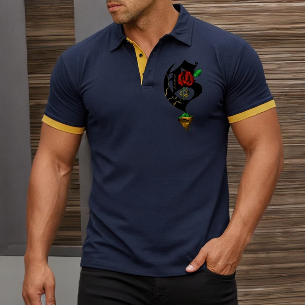 Man wearing a navy blue polo shirt with yellow trim and a graphic design on a wooden background