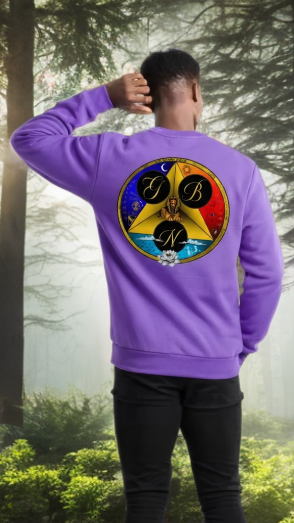 Person wearing a purple sweatshirt with a colorful circular design in a forest setting