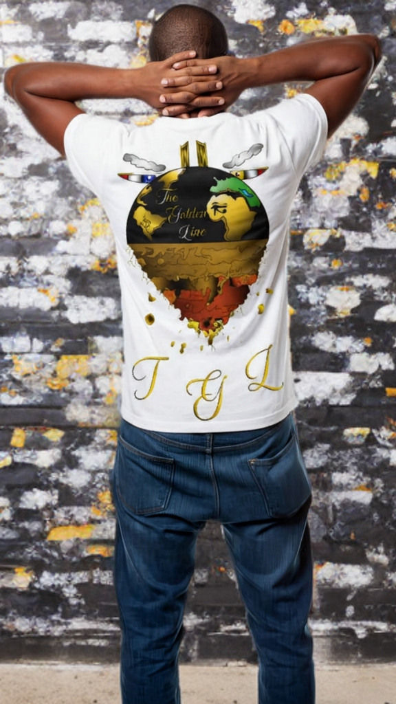 Person wearing a white t-shirt with a colorful design and text, standing against a textured wall.