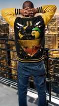 Person wearing a colorful sweater with a cityscape in the background